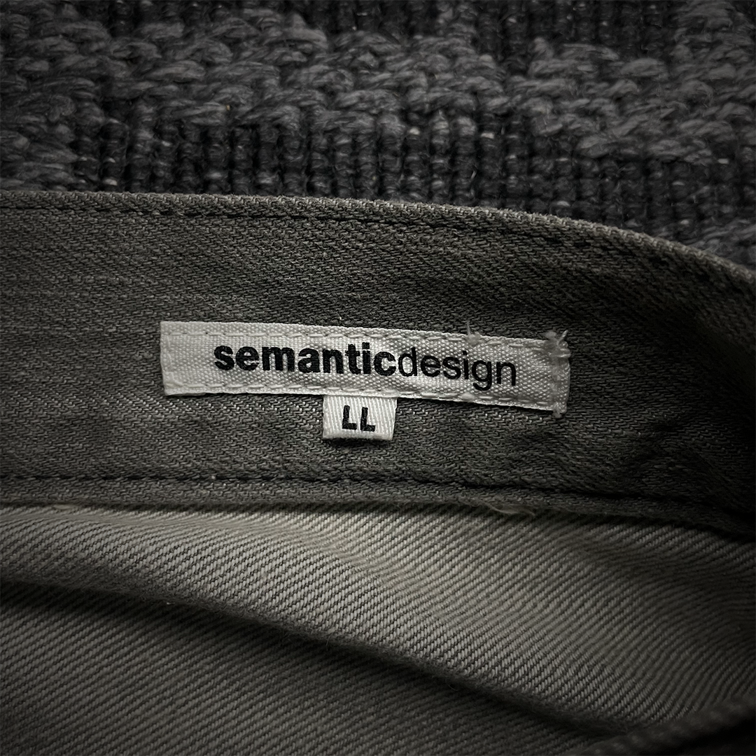 Semantic Design Mud Wash Snake Skin Flare Jeans