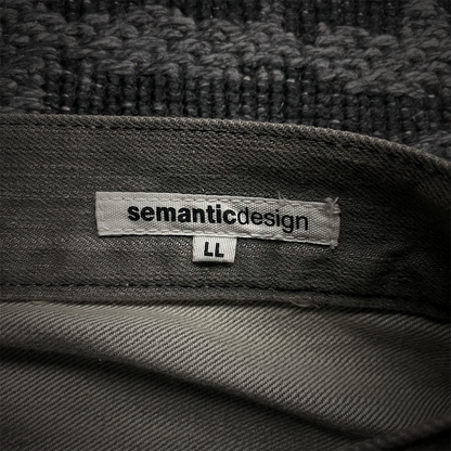 Semantic Design Mud Wash Snake Skin Flare Jeans